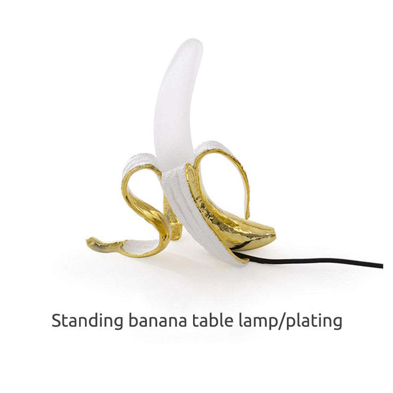 Arisha Diseña Moderna Plátano Lámpara de Mesa Dorada/Amarilla