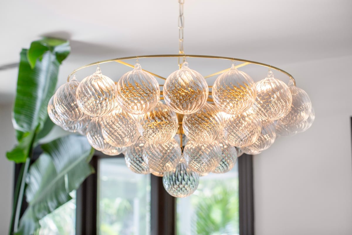 Aurora Chandelier Clear Glass Globe Aged Brass Elegant - Letslighting