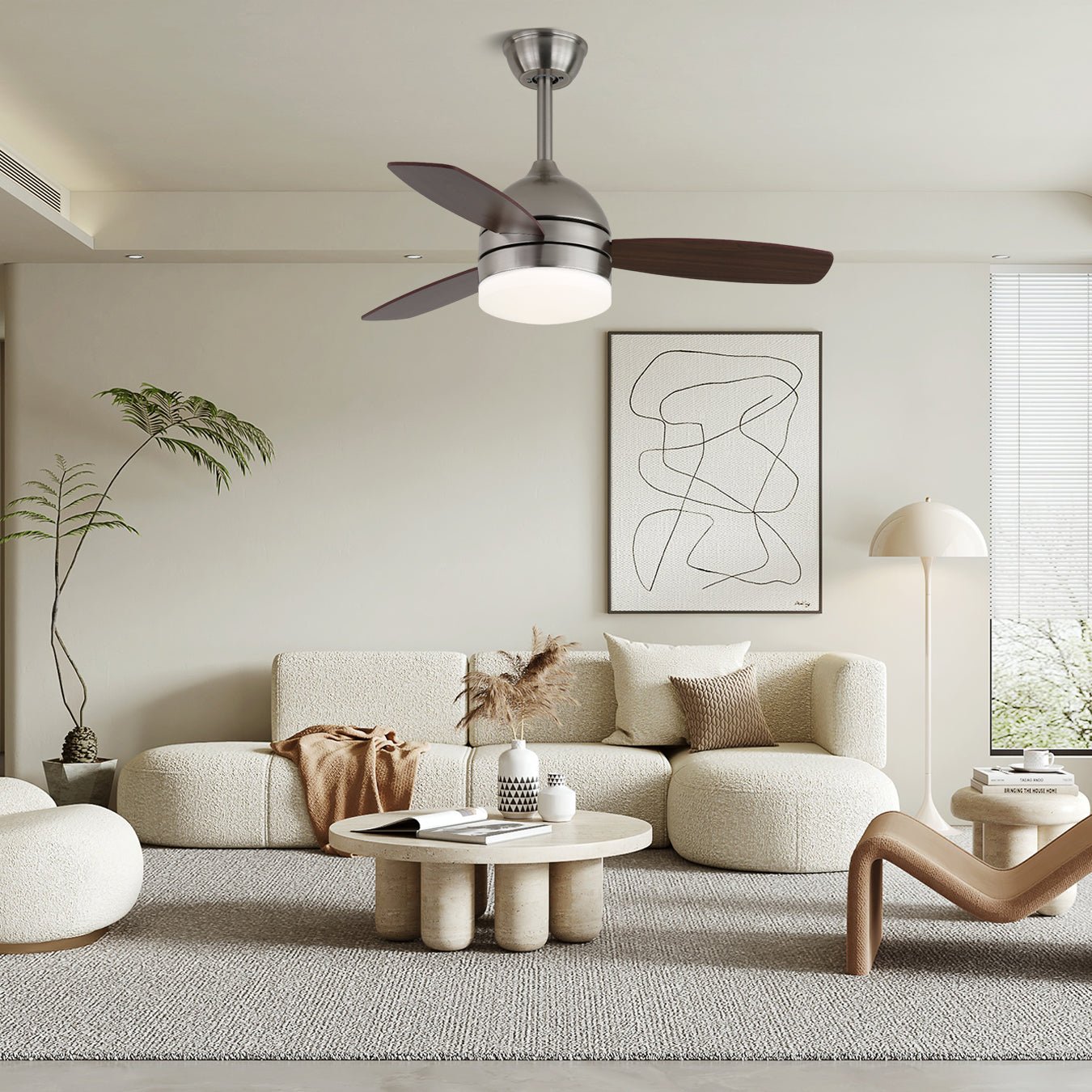 Ventilador de techo Caelan con luz instalado en un salón moderno